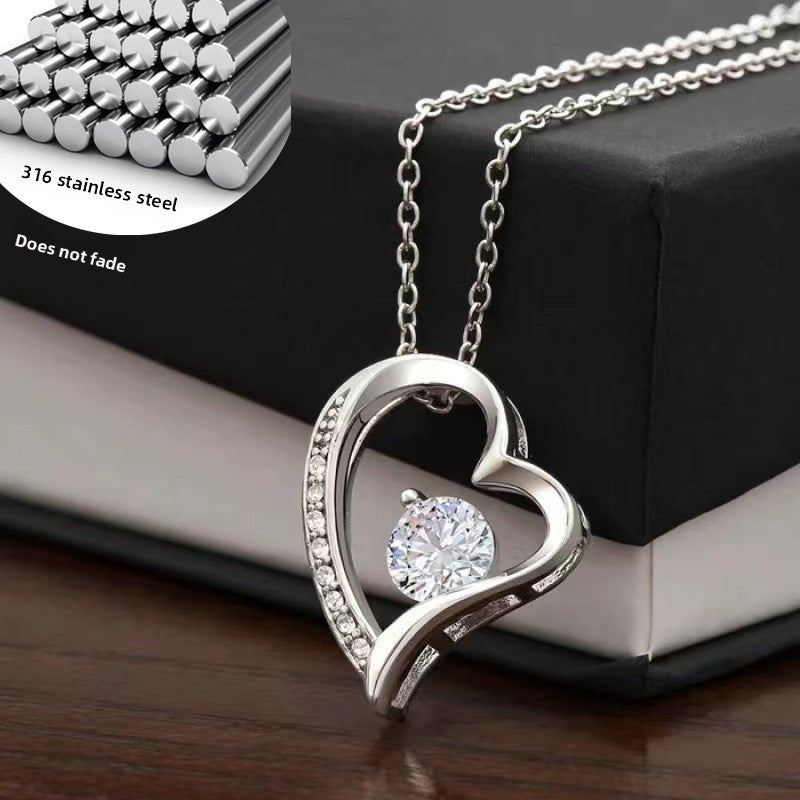 Collar Corazón con Zirconia | Oro Blanco y Oro Amarillo